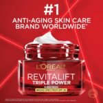L'Oreal Paris Revitalift Triple Power SPF 30 Face Moisturizer, 2.55 Oz - Image 6